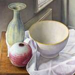 Three simple pots on white cloth