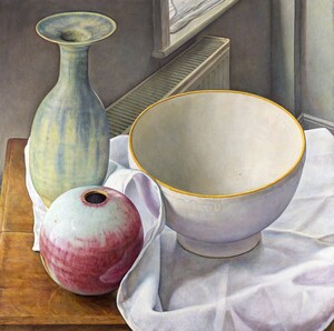 Three simple pots on white cloth